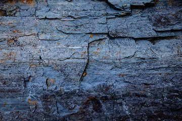  Fondo de textura de roca gris azul erosionada. Superficie de piedra natural rugosa con detalles en capas  transmite resistencia geológica y entorno crudo. © C.Castilla