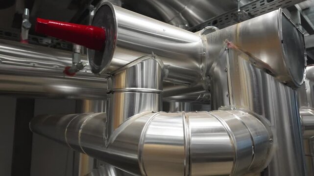 Stainless Steel Insulated Industrial Pipeline and Valves System at Modern Chemical or Power Plant