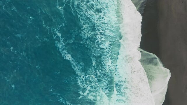 Sea waves crash tirelessly on a Calabrian beach, persistent concept