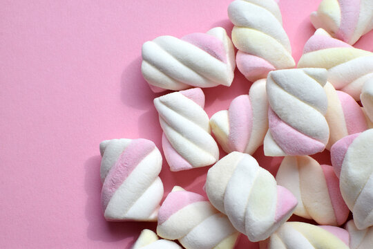 Multi-colored marshmallows. Background or texture of colorful blue and pink marshmallows.