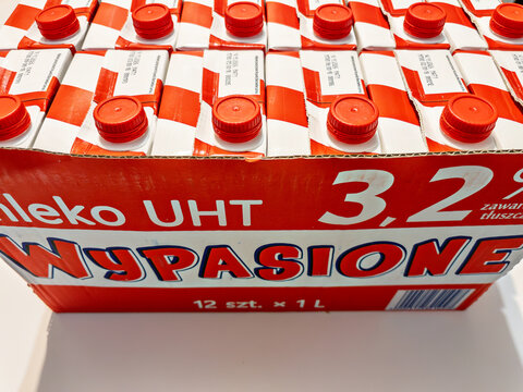 WARSAW, POLAND - MAY 7, 2026: Open carton box of Mlekovita Wypasione UHT milk