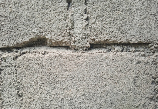 close up texture of grey concrete cinder block wall background
