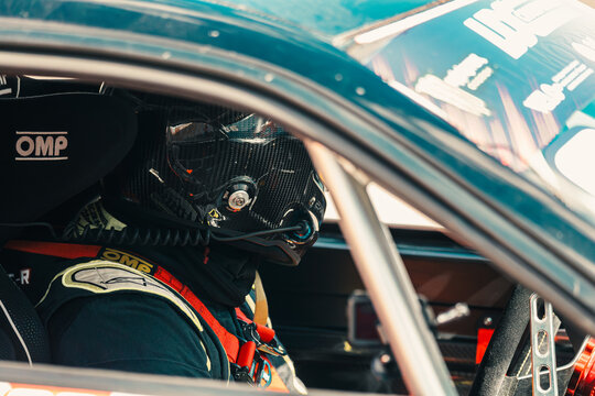 Driver prepares for race in Lviv, Ukraine during motorsport competition