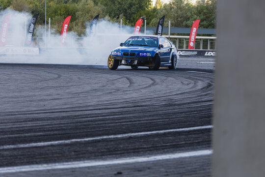Drifting action at a racetrack in Lviv, Ukraine during motorsport event