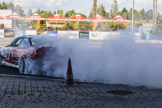 Drifting car releases smoke at racetrack in Lviv, Ukraine