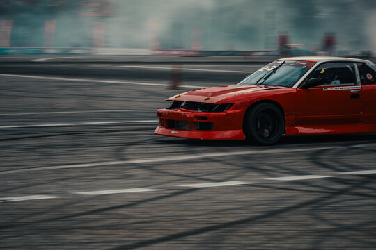 Drifting car speeds around a racetrack in Lviv, Ukraine