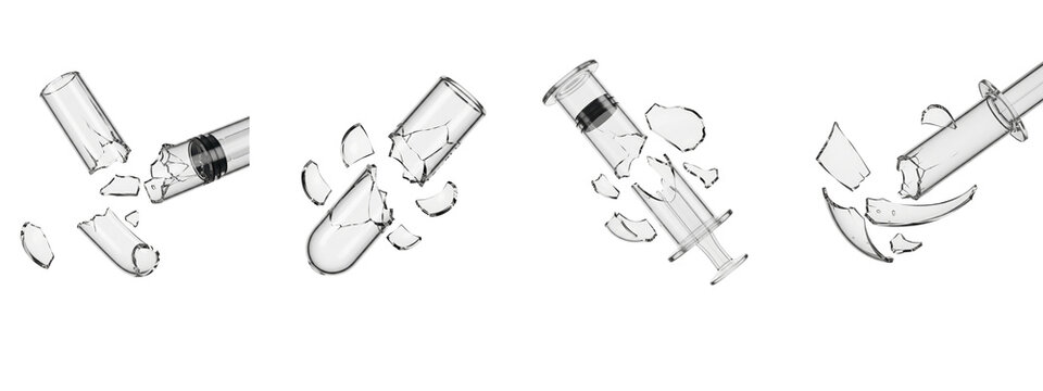 Set of broken medical syringes isolated on a black background