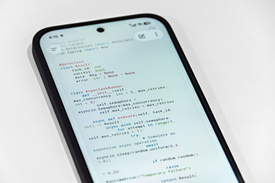 Close-Up Smartphone Displaying Python Async Programming Code on a Clean White Background
