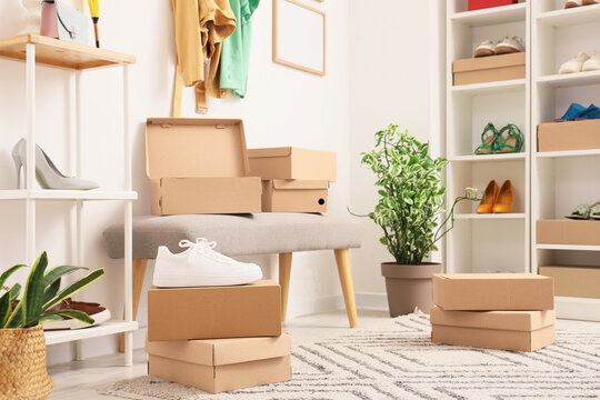 Soft bench with shoe boxes in wardrobe