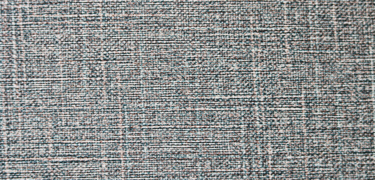 Woven grey and white fabric texture with subtle horizontal lines.