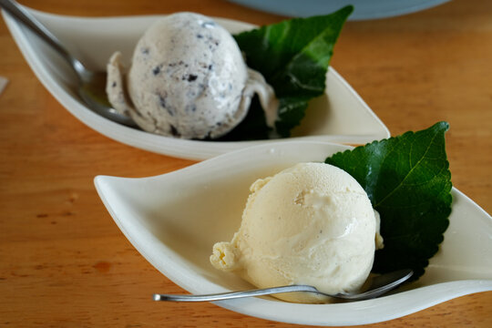 Homemade organic vanilla ice cream with mint, lemon ice cream and chocolate. Summer rest. Delicious and sweet dessert