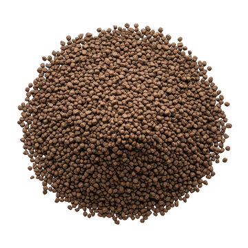 Pile of brown fish food pellets isolated on a white background