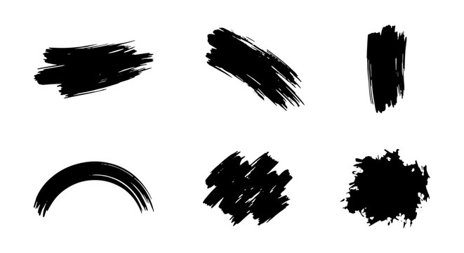 Brush strokes collection displaying artistic paint textures and ink marks on white background.