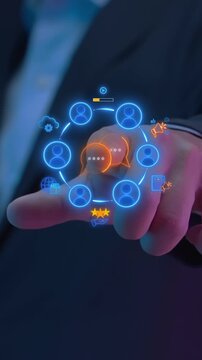 Businessman finger touching glowing chat speech bubble hub vertical shot with user community network. Omnichannel social media communication, customer engagement, and review feedback idea concept.