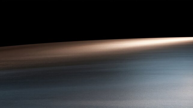 Abstract curved surface with gradient lighting and reflective texture
