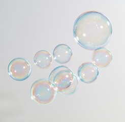 Obraz premium Colorful iridescent soap bubbles floating against a plain