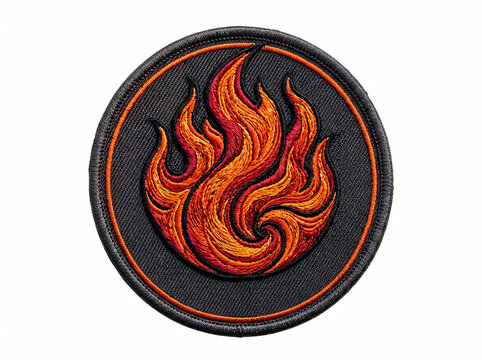 Embroidered fire patch with orange and red flame design on a black circular background, isolated on white background