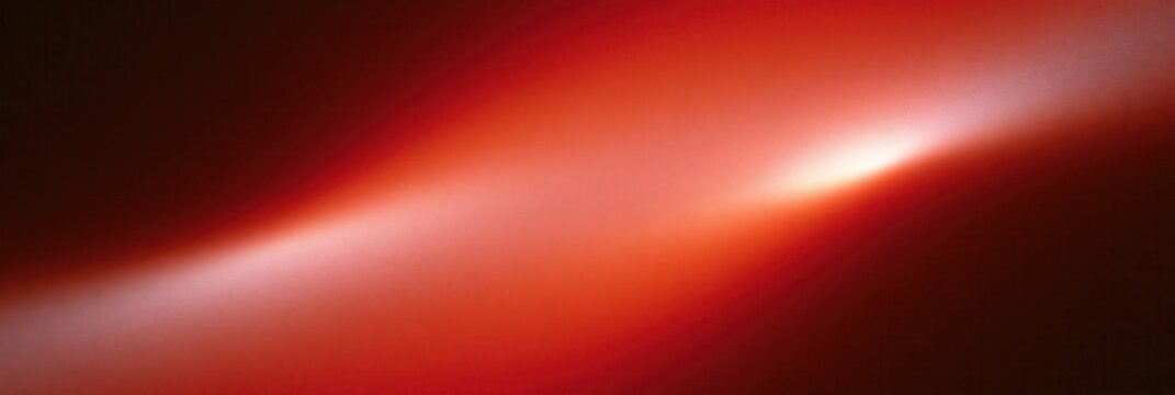 Abstract red gradient with soft light sweep and dark corners