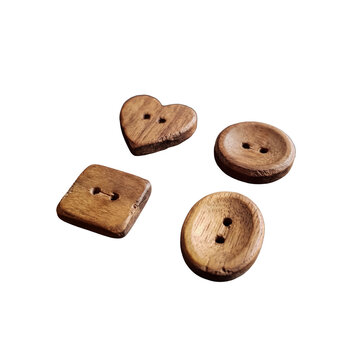 Collection of four natural wooden buttons in various shapes
