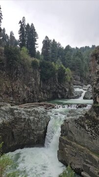 Aharbal Waterfall in Kashmir, Majestic Mountain Waterfall Surrounded by Lush Green Forest, India