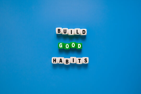 build good habits words symbol on cubes. isolated on blue background. motivational words concept