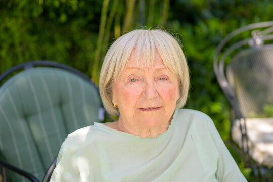 Senior Woman Relaxing Garden Outdoors
