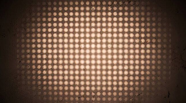 Light filtering through perforated metal grid creating geometric shadow pattern