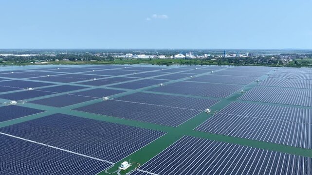 Aerial view of vast solar panel power station array