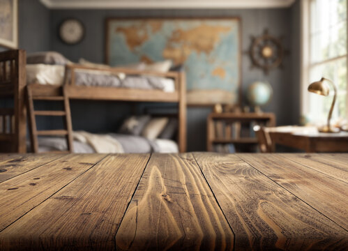 Blurred bedroom interior features wooden bunk bed and world map wall art. Cozy interior decor creates calm, adventurous mood with warm wood furniture, desk lamp, and soft daylight near window.