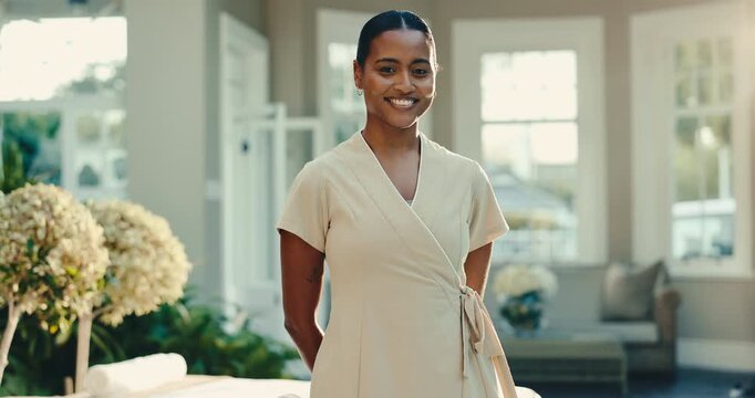 Worker, woman and massage therapist with smile at spa for holistic healing, wellness and luxury. Face, happy person and salon masseuse, therapy assistance service and professional at resort garden