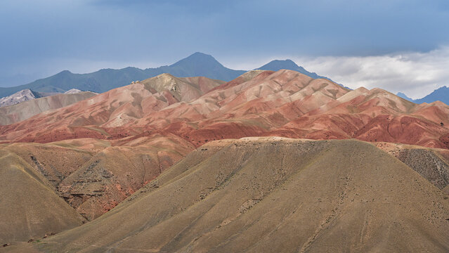 Colorful mountain landscape view of Gulcha valley on moody summer afternoon, Osh, Kyrgyzstan