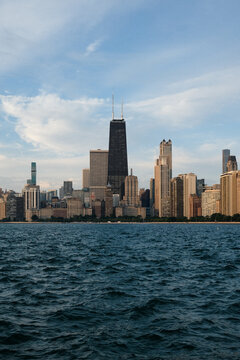 Vertical Chicago Skyline Over Choppy Lake Michigan Water