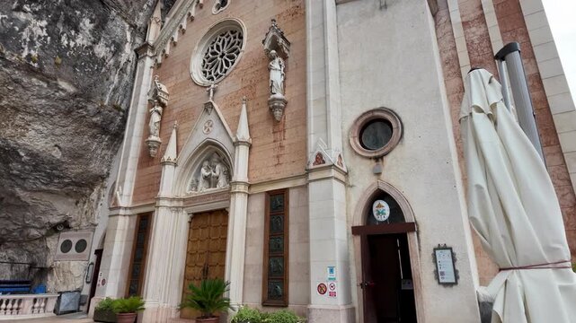 Santuario Madonna della Corona in northern Italy, built into a rocky cliff near Ferrara di Monte Baldo
