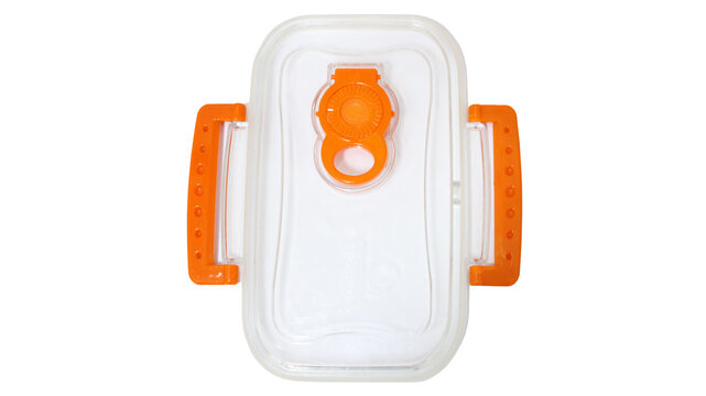 Cover of orange airtight plastic food container