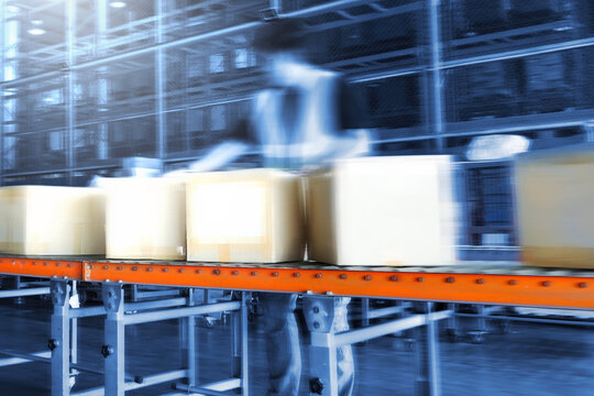 Workers Moving a Package Boxes on Conveyor Belt. Cardboard Boxes, Package. Business e- commerce. Storage Warehouse. Delivering Supply Chain, Supplies Shipment. Warehouse Shipping Logistics.