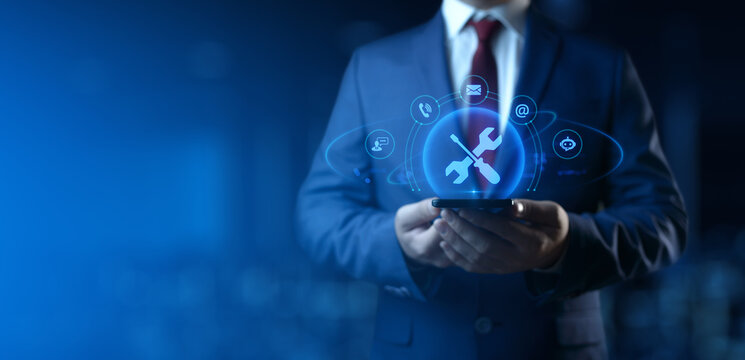 Businessman Holding smartphone with Technical Support Icons on Screen. Customer Service and Support concept