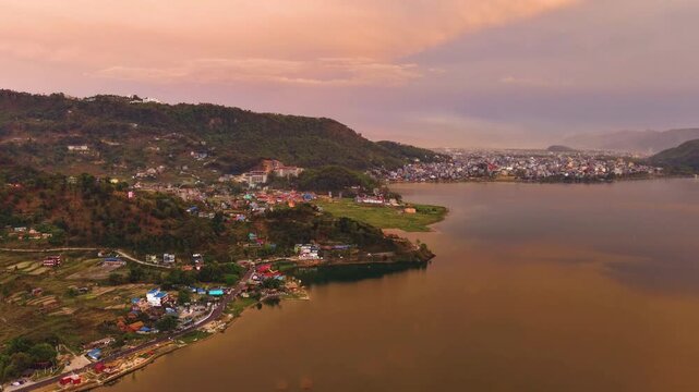 Drone hyperlapse of Phewa Lake and Pokhara cityscape in Nepal