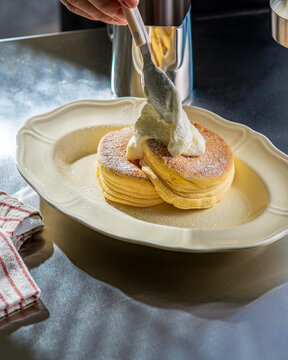 Adding Cream to Fluffy Japanese Souffle Pancakes