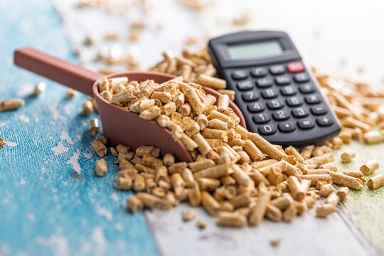 Pellet Fuel Cost Calculation With Calculator and Wood Pellets for Home Heating Budget and Energy Savings