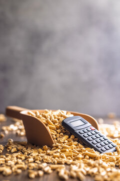 Wood Pellet Fuel Scoop With Calculator for Energy Cost Calculation and Biomass Heating Budgeting