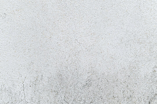 Wall texture background with abstract stains, scratches, and aged surfaces providing a unique vintage backdrop.