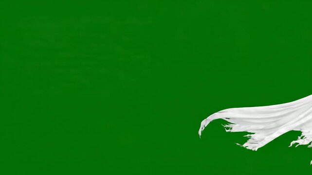 Ghost flying across green screen, spooky white sheet spirit character for halloween visual effects and compositing