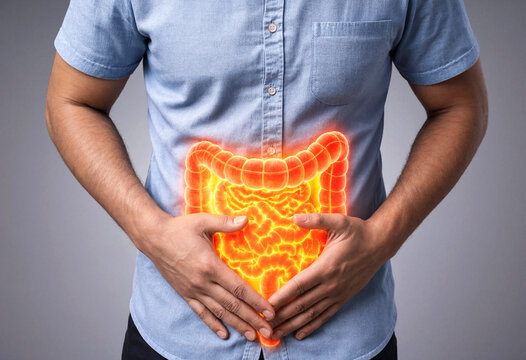 Person holding abdomen showing inflamed digestive system illustration overlay