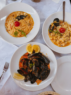 Delicious Seafood Dishes on a Dining Table