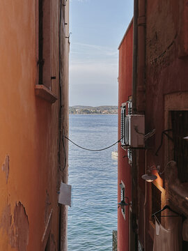 View of the Sea from Narrow Alleyway