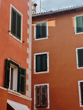 Colorful Building Facades with Shuttered Windows