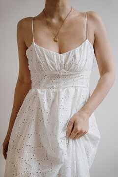Close-Up of Woman in White Dress