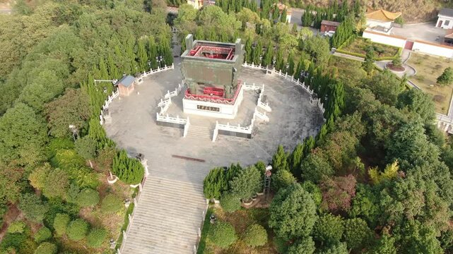 Aerial view of ancient bronze ding monument in forest park