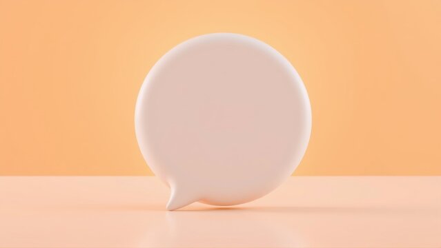 Pale speech bubble stands on surface. Soft lighting, minimalist design, peach tones dominate scene. Simple, clean aesthetic.