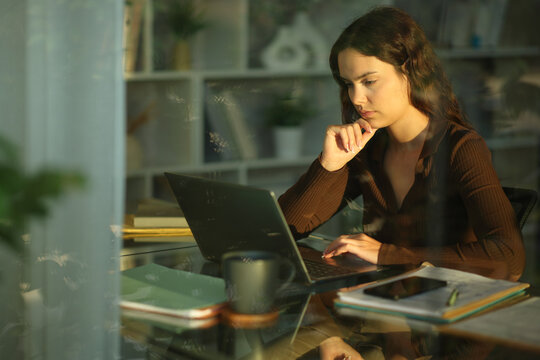 Telecommuter thinking while working online at home
